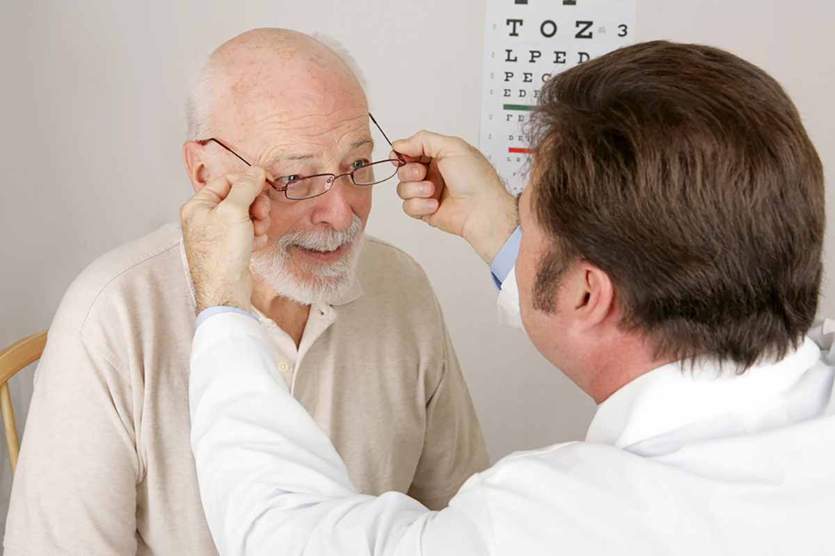 Medicare Insurance - Elderly man receiving vision care